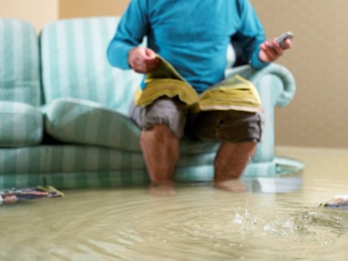 Man in flooded room
