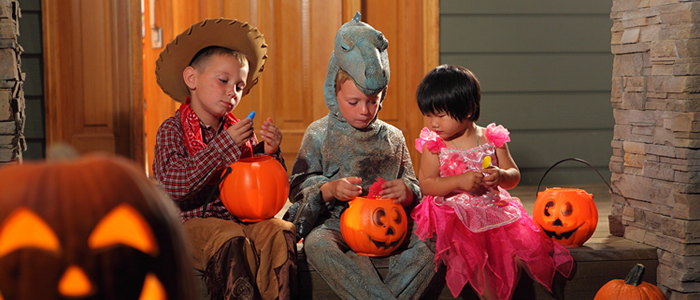 Children sorting Halloween candy